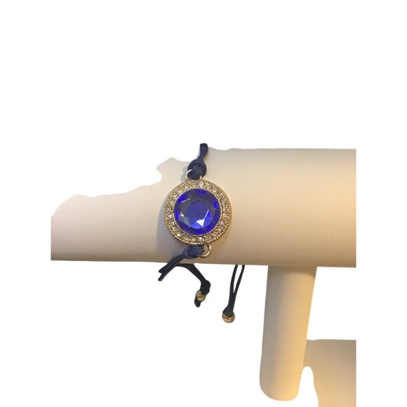 Vintage Avon Blue Energy String Bracelet W/Blue Crystal & Gold  (1626-1-2-3) - Picture 1 of 5